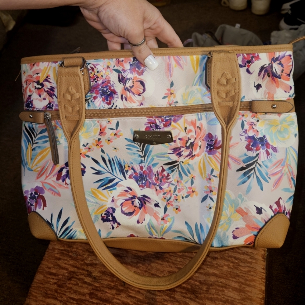 Various purses. Rosetti floral, Nine West gray, and Steve Madden gold.